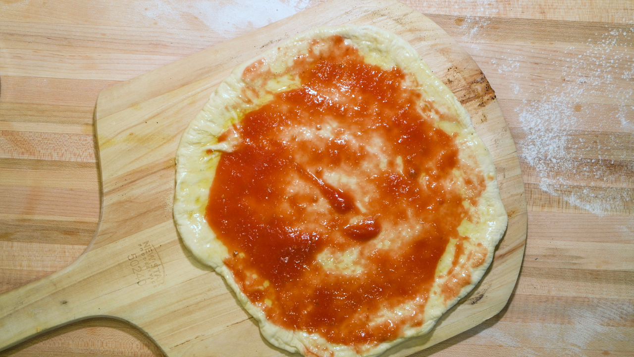 Add the Sauce to Within 1" of the Edge