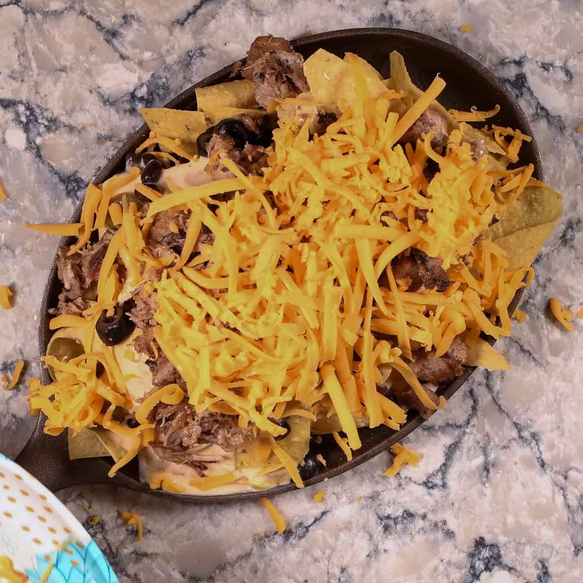 Add cheddar cheese then bake.