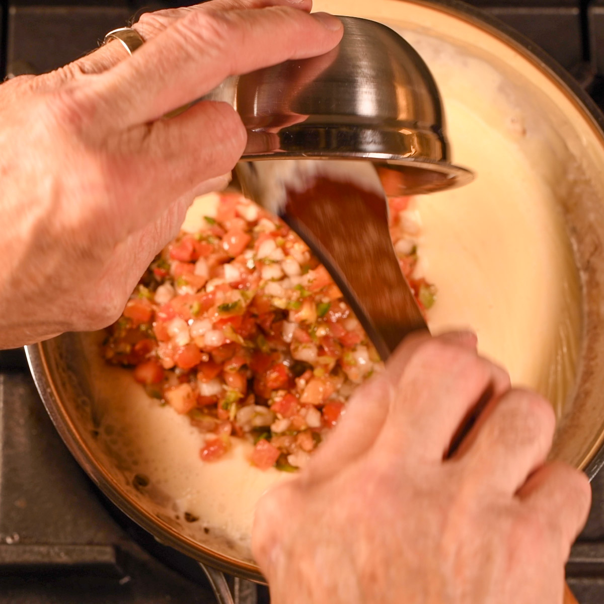 Add the pico do gallo to the queso.