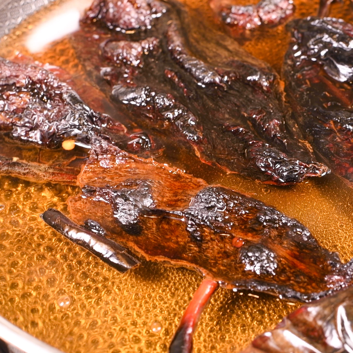 Soak the toasted chiles.