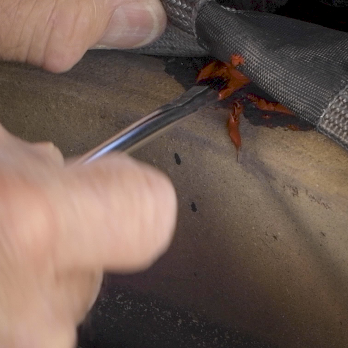 Apply high-heat gasket making material under the tap joint.