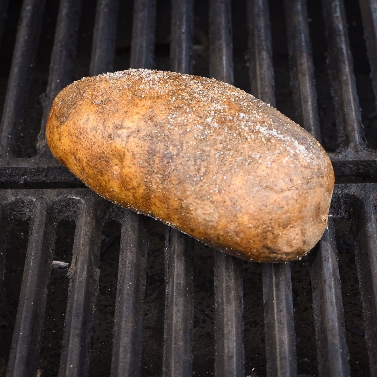 Place the potatoes directly on the grill grate.