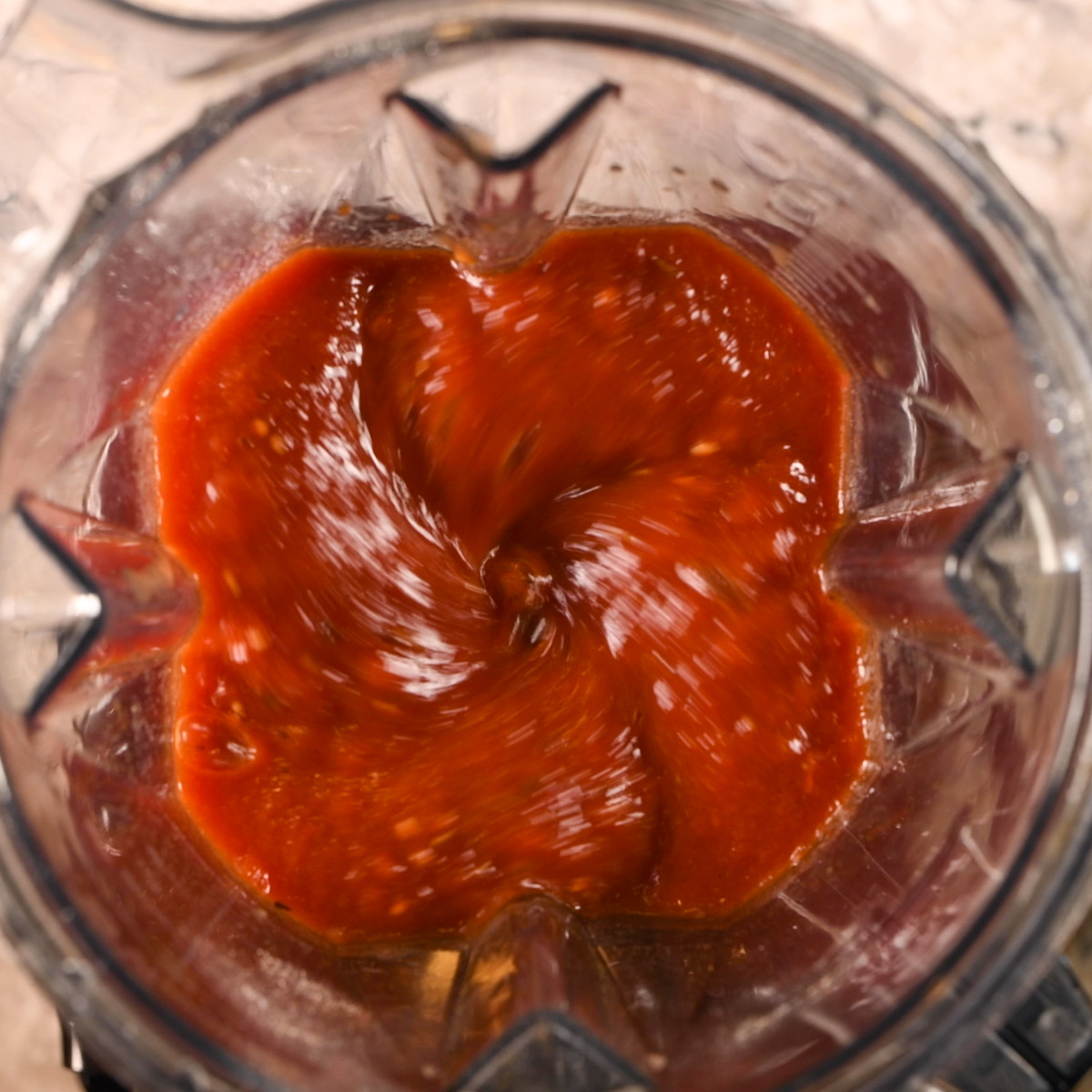 Blend the birria sauce until smooth.