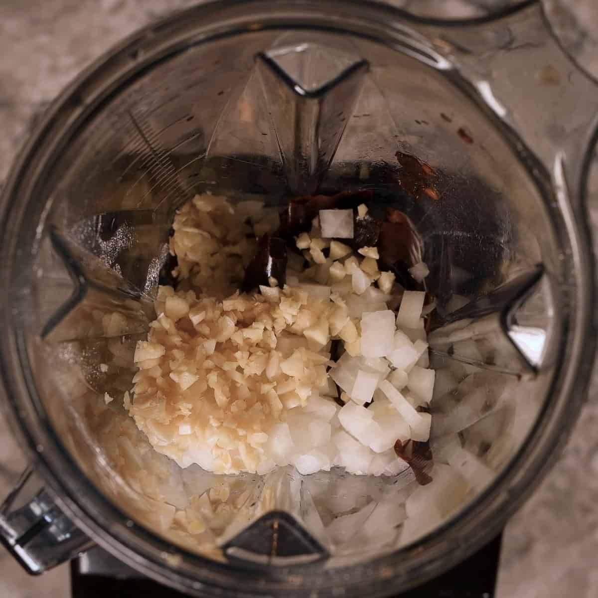 Blend the chiles and onions together.