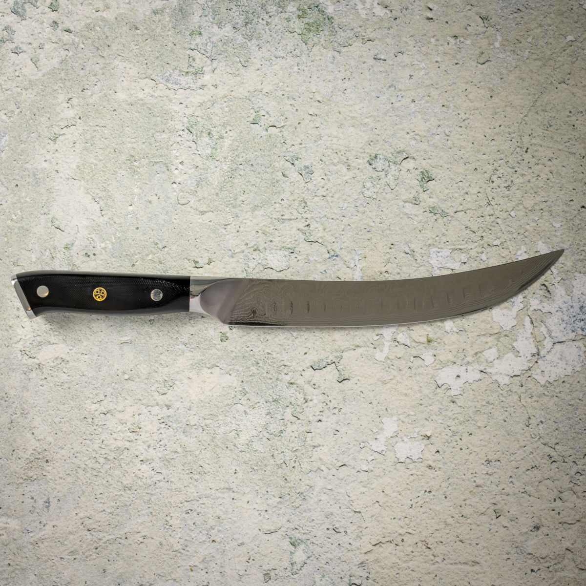 The breaking knife is for dividing large cuts of meat.