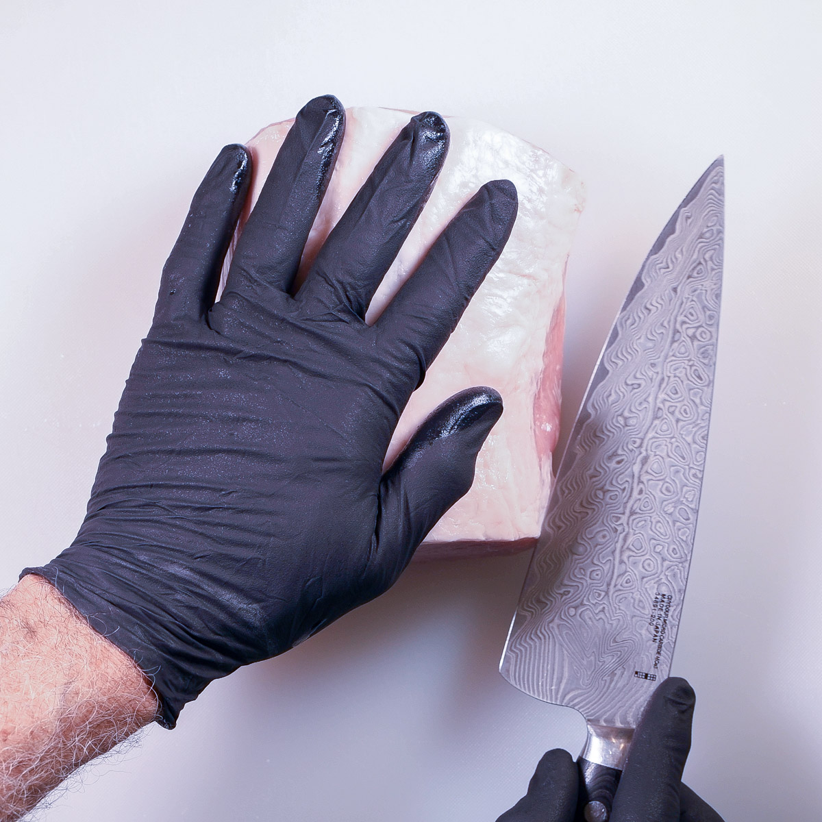 Butterfly open the pork loin.