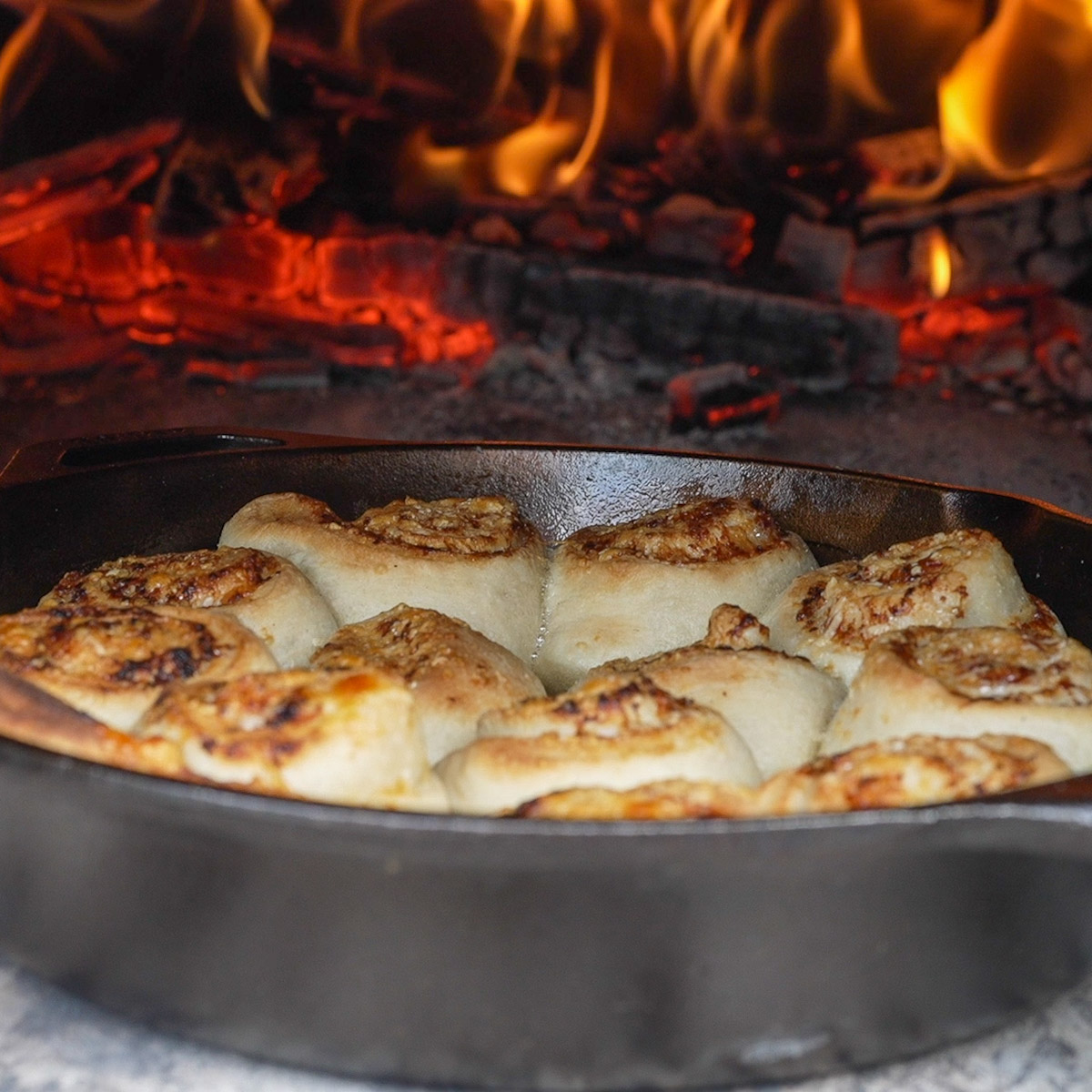 Cheesy garlic rolls after 10 minutes in a wood-fired oven.