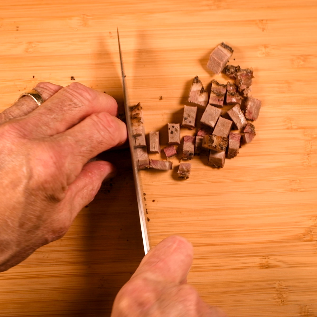 Chop the leftover brisket.
