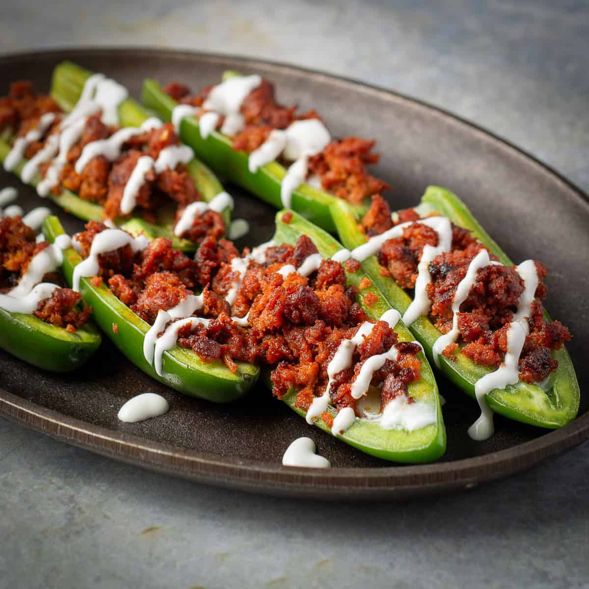 Chorizo stuffed jalapeño poppers.