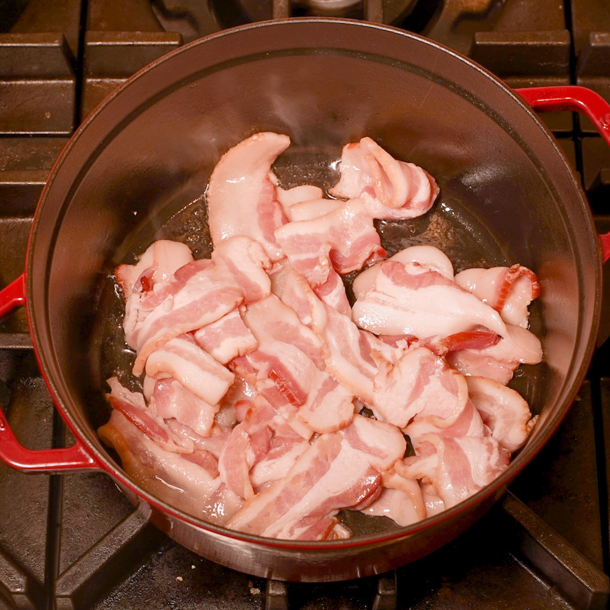 Cook the bacon in a Dutch oven.