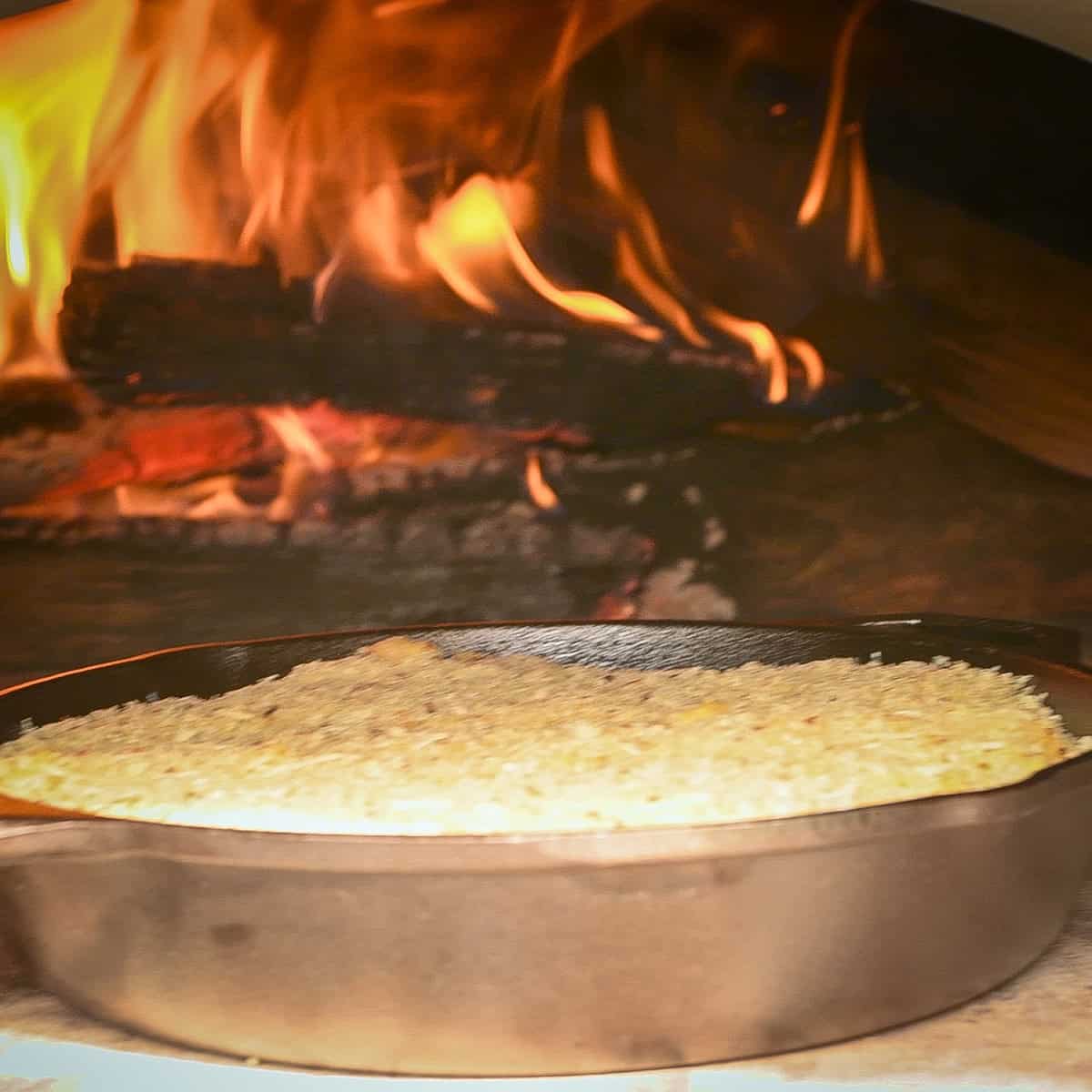 Place in smoker or wood-fired oven.