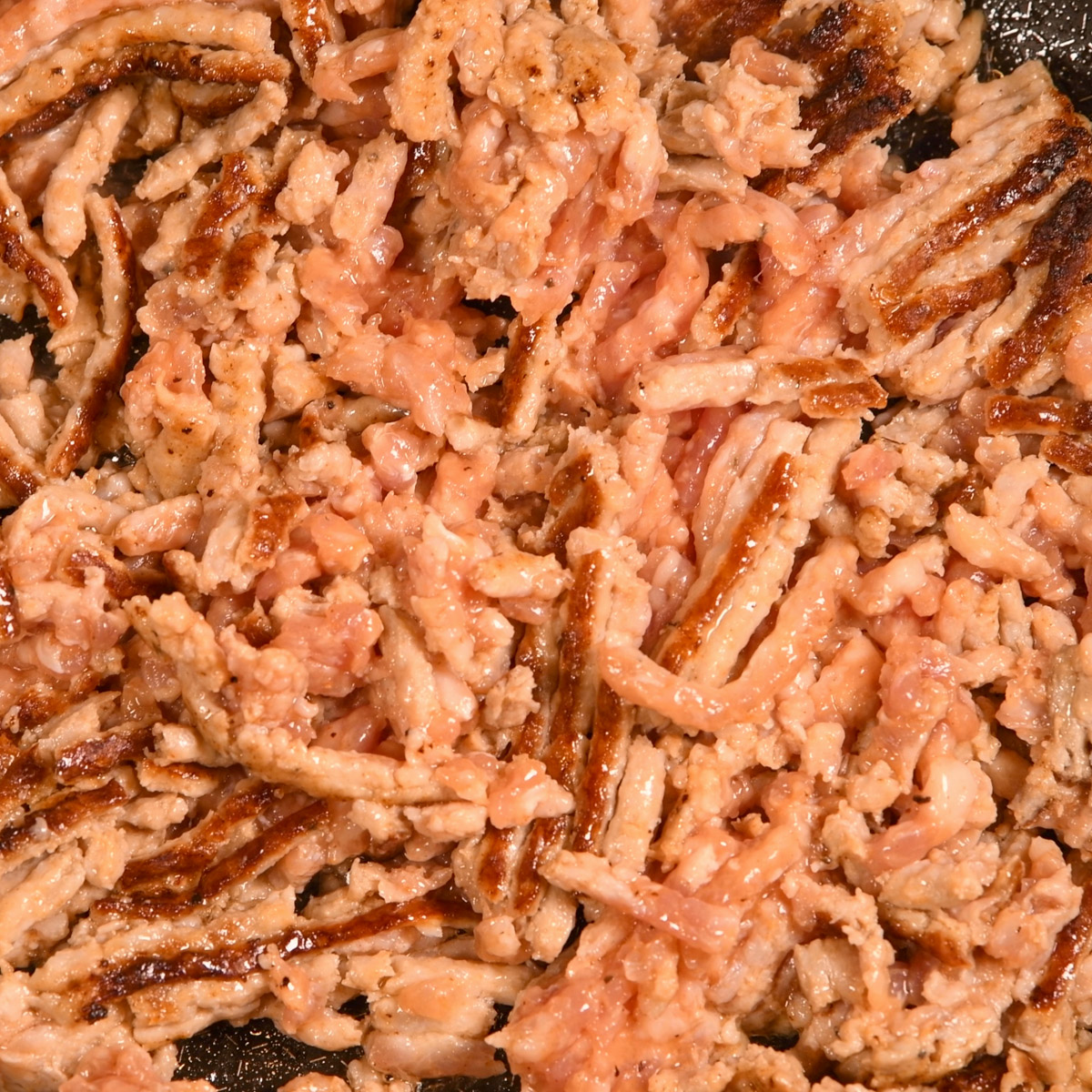 Cook the sausage until browned.