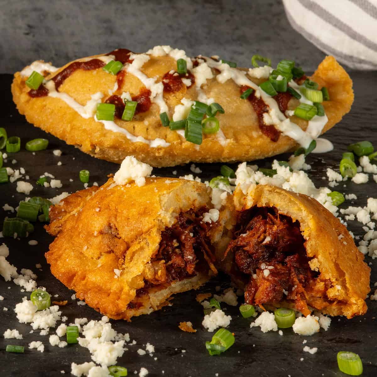 Empanada with carnitas filling.