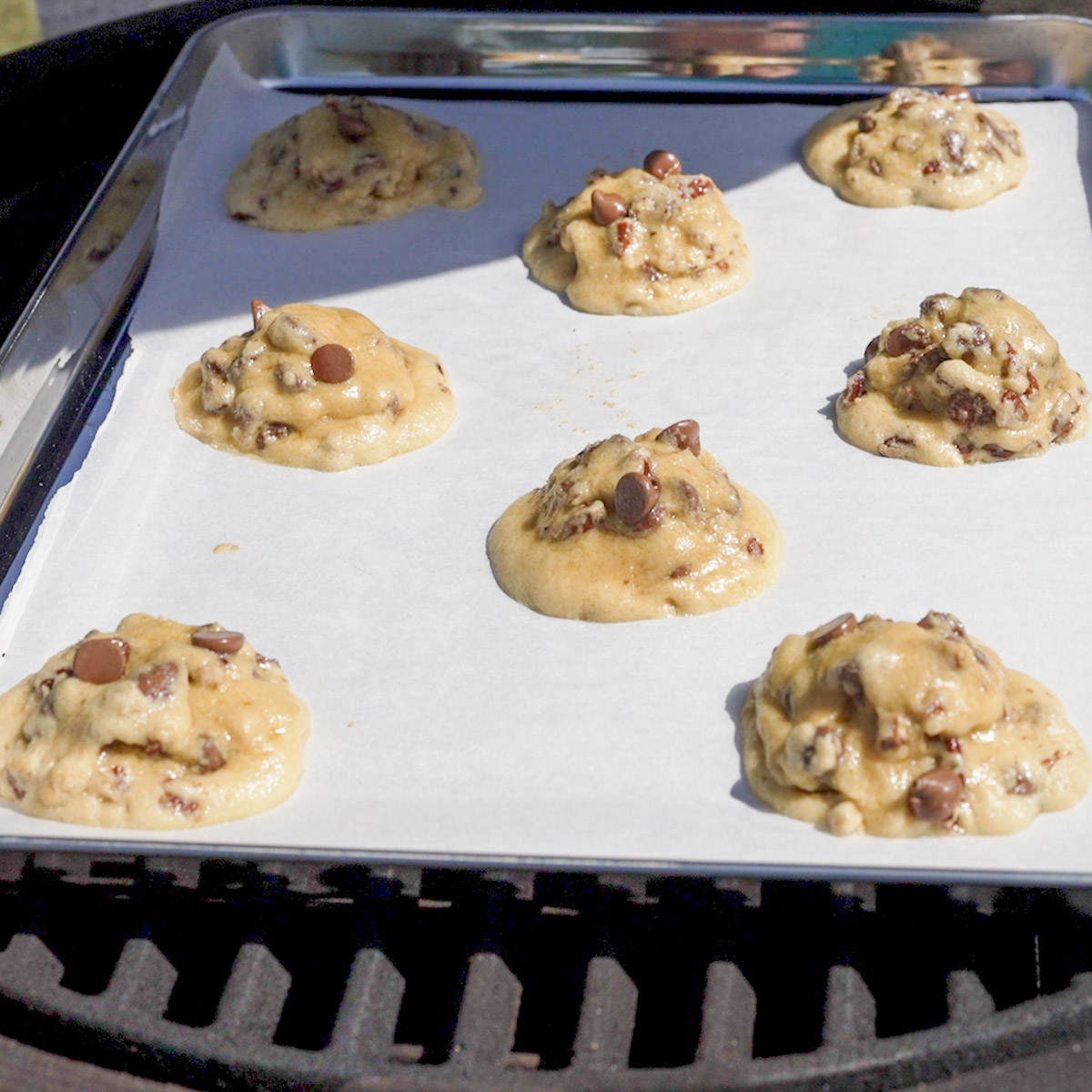 Chocolate chip cookies baking in a Kamado Joe.