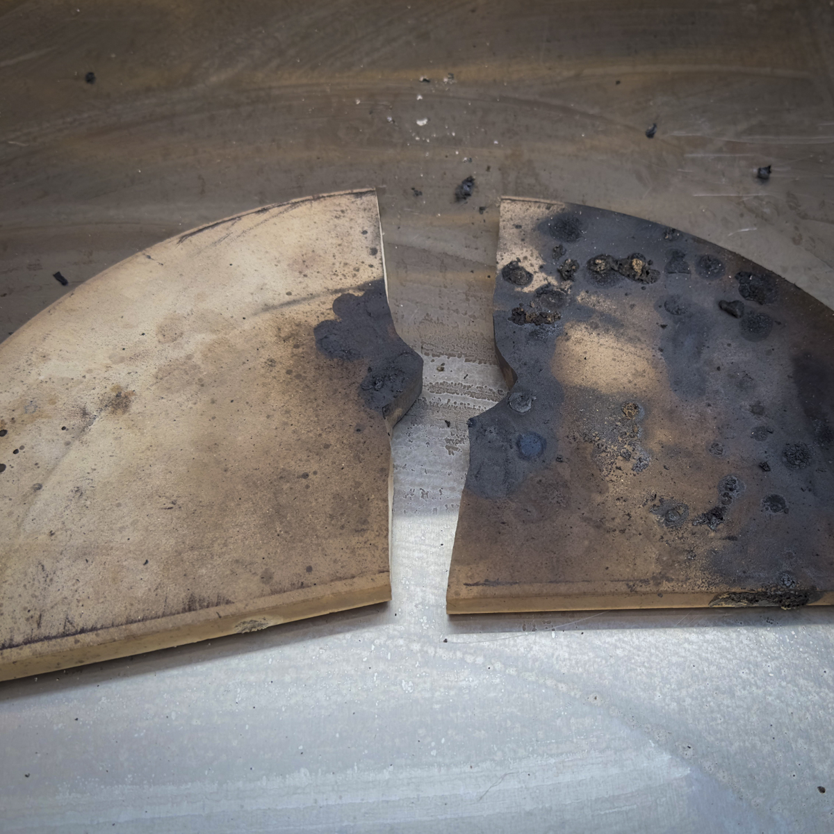 Broken Kamado Joe heat deflector plate.