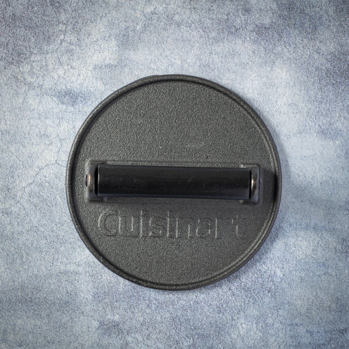 The Cuisinart cast-iron burger press measures 6-inches in diameter and has a wood handle.