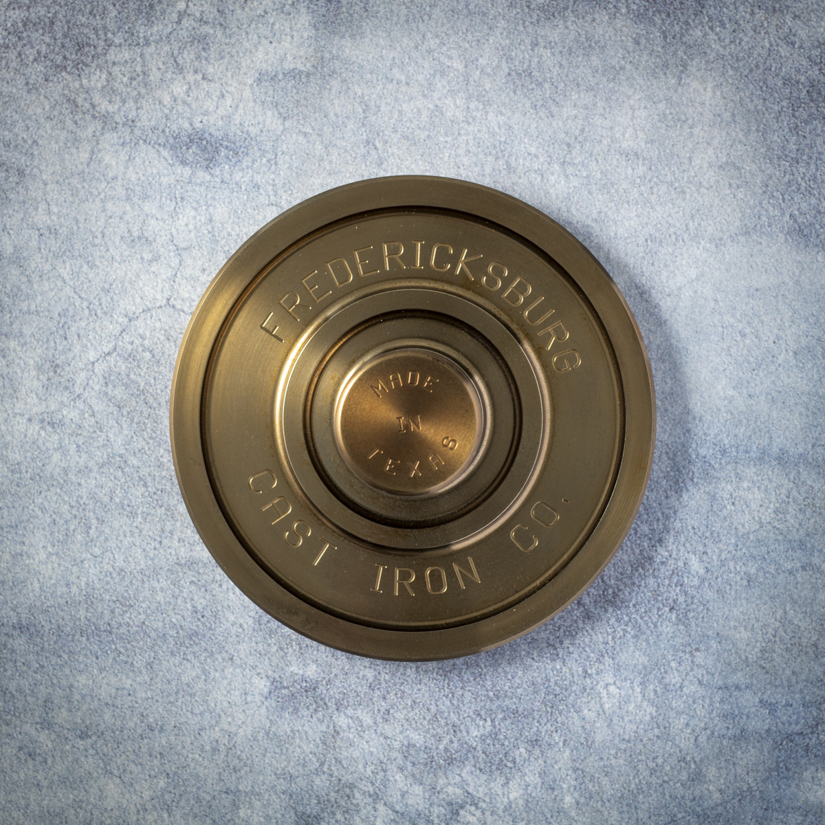 The Fredericksburg cast iron burger press weighs nearly 4 pounds.