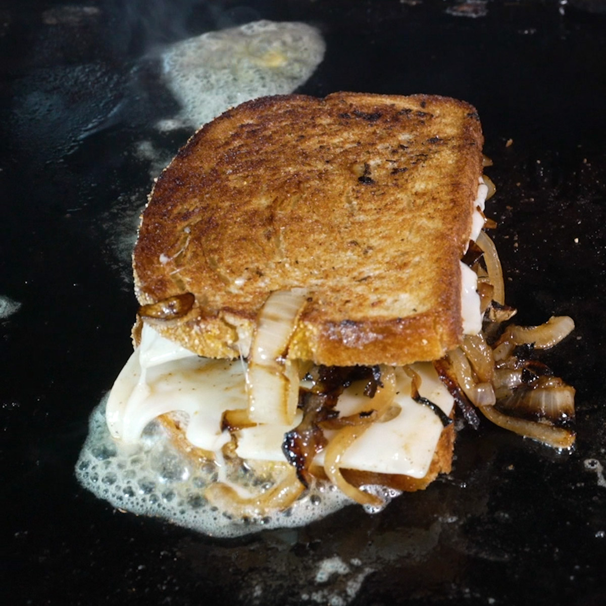 Grilled patty melt is ready to serve.