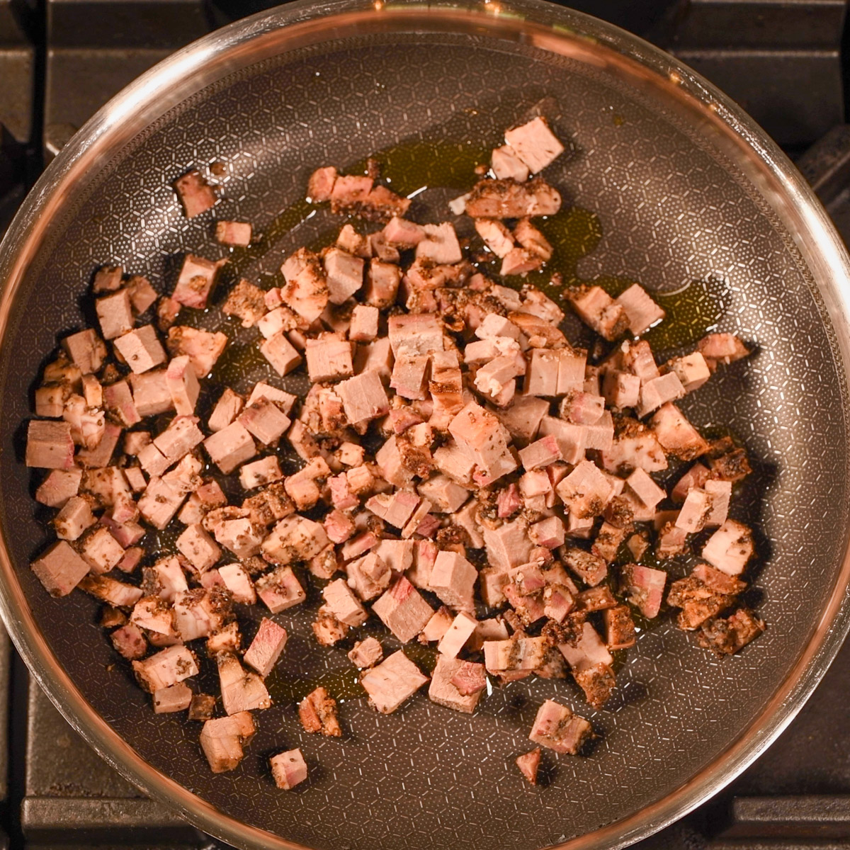 Reheat chopped brisket in a skillet.