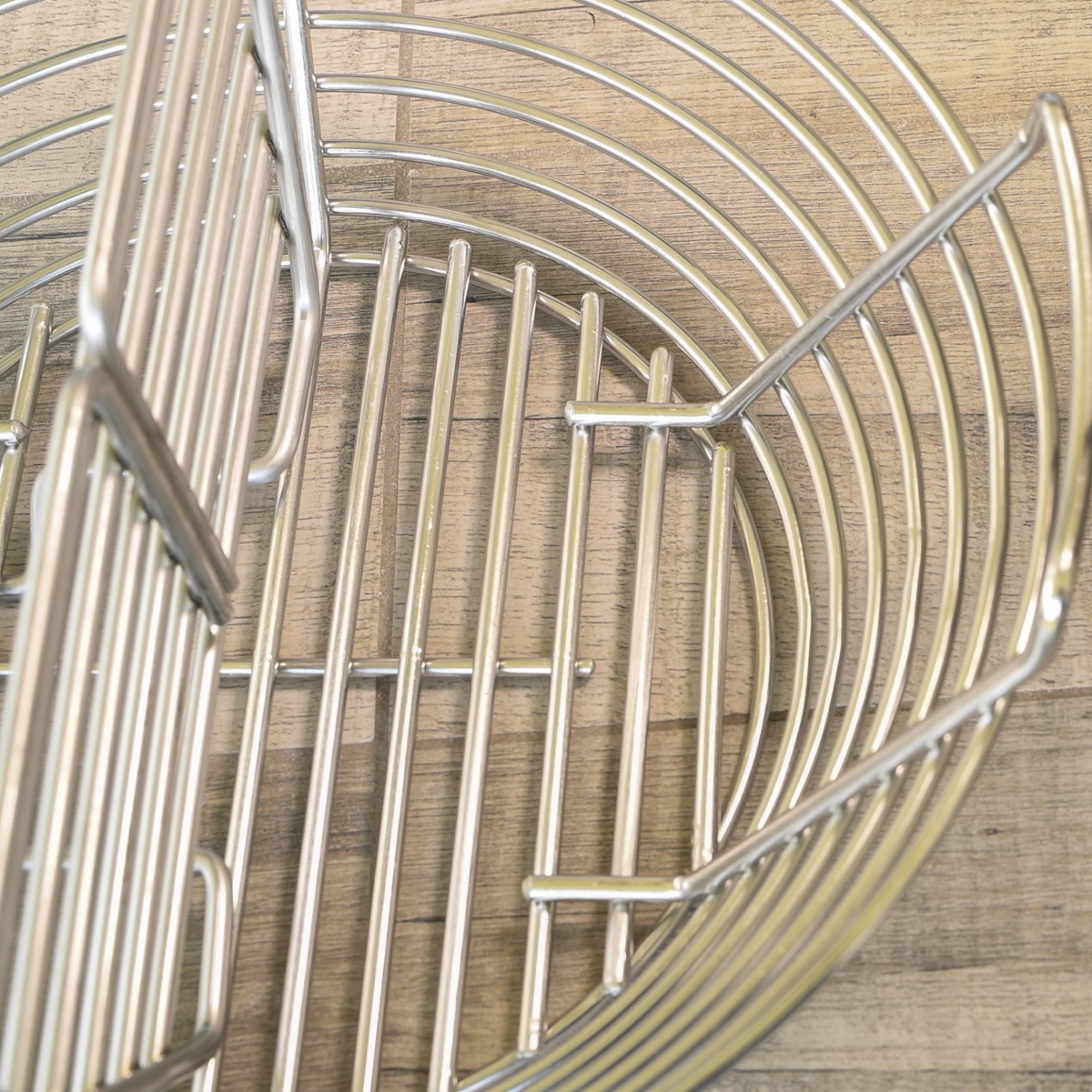 The Kick Ash Basket has wider gaps between the bars.