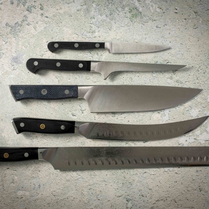 Five essential kitchen knives for barbecue preparation and carving.