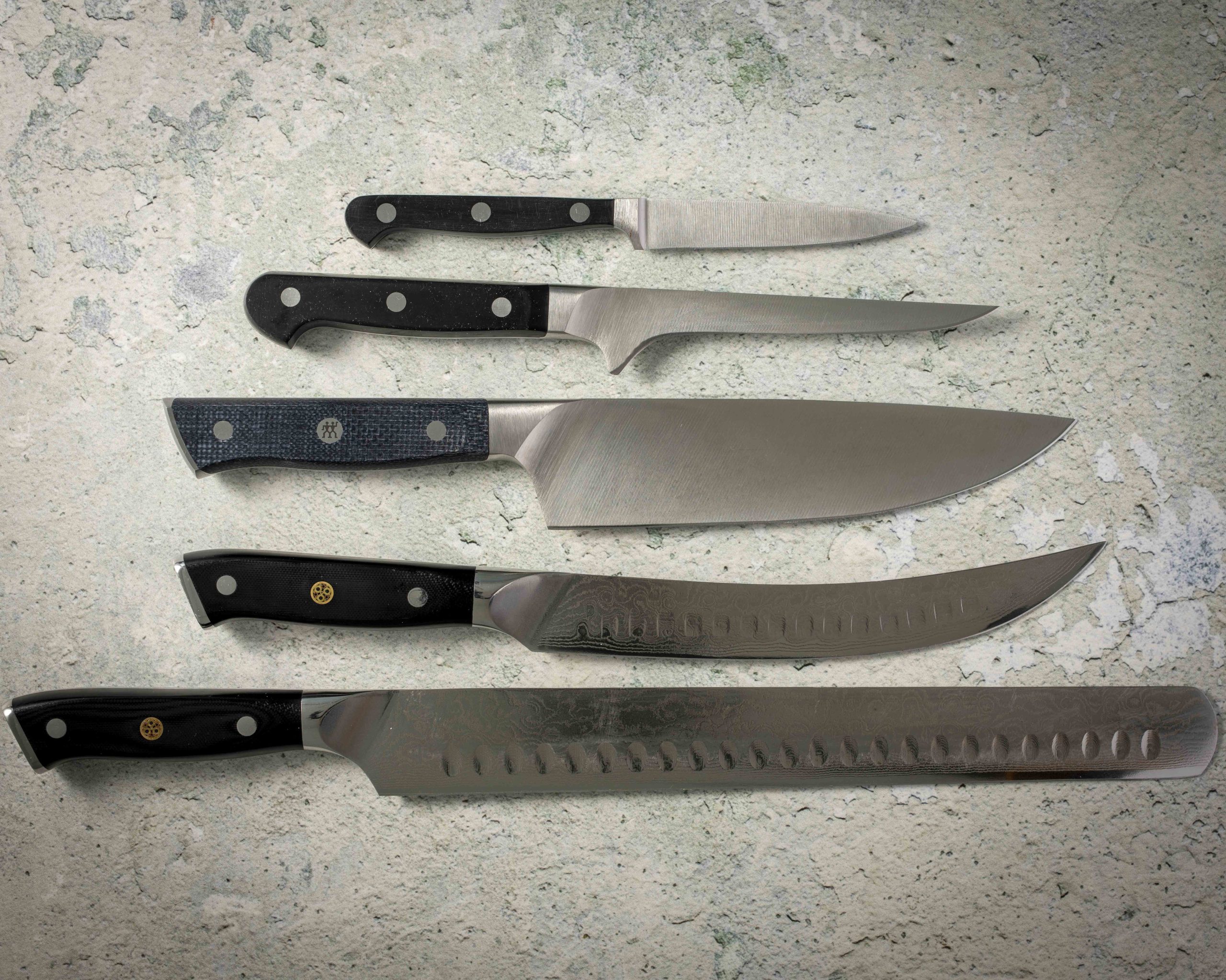 Five essential kitchen knives for barbecue preparation and carving.