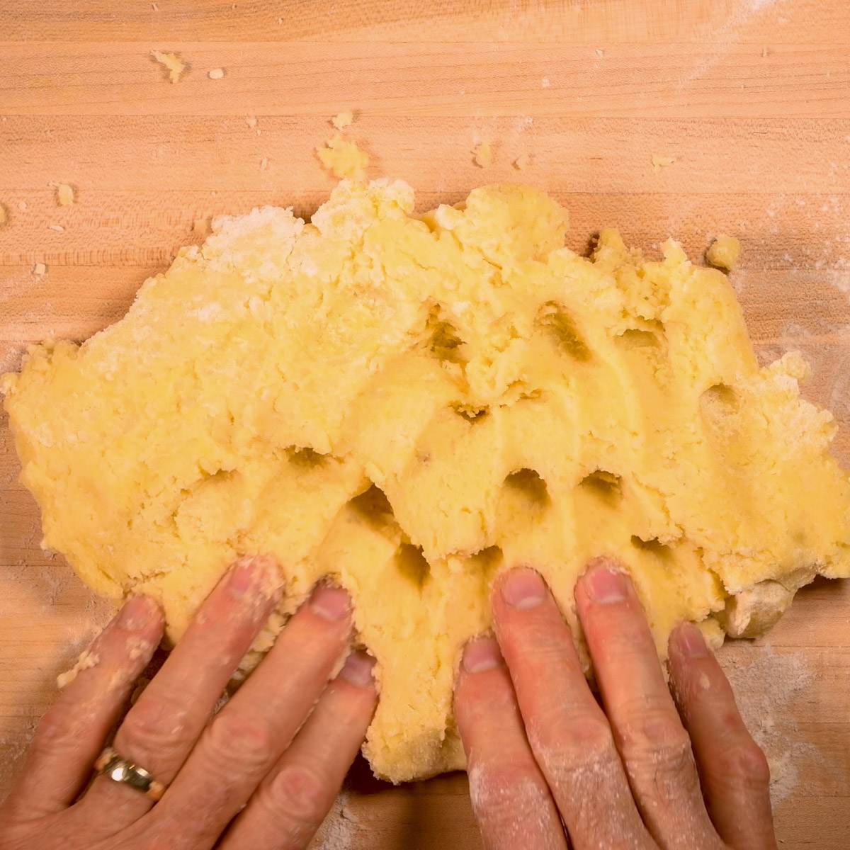 Kneed the dough until smooth.