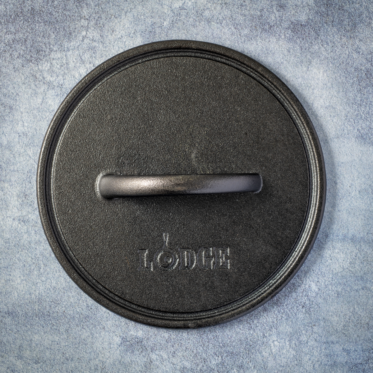 Lodge 8-inch cast-iron burger press.