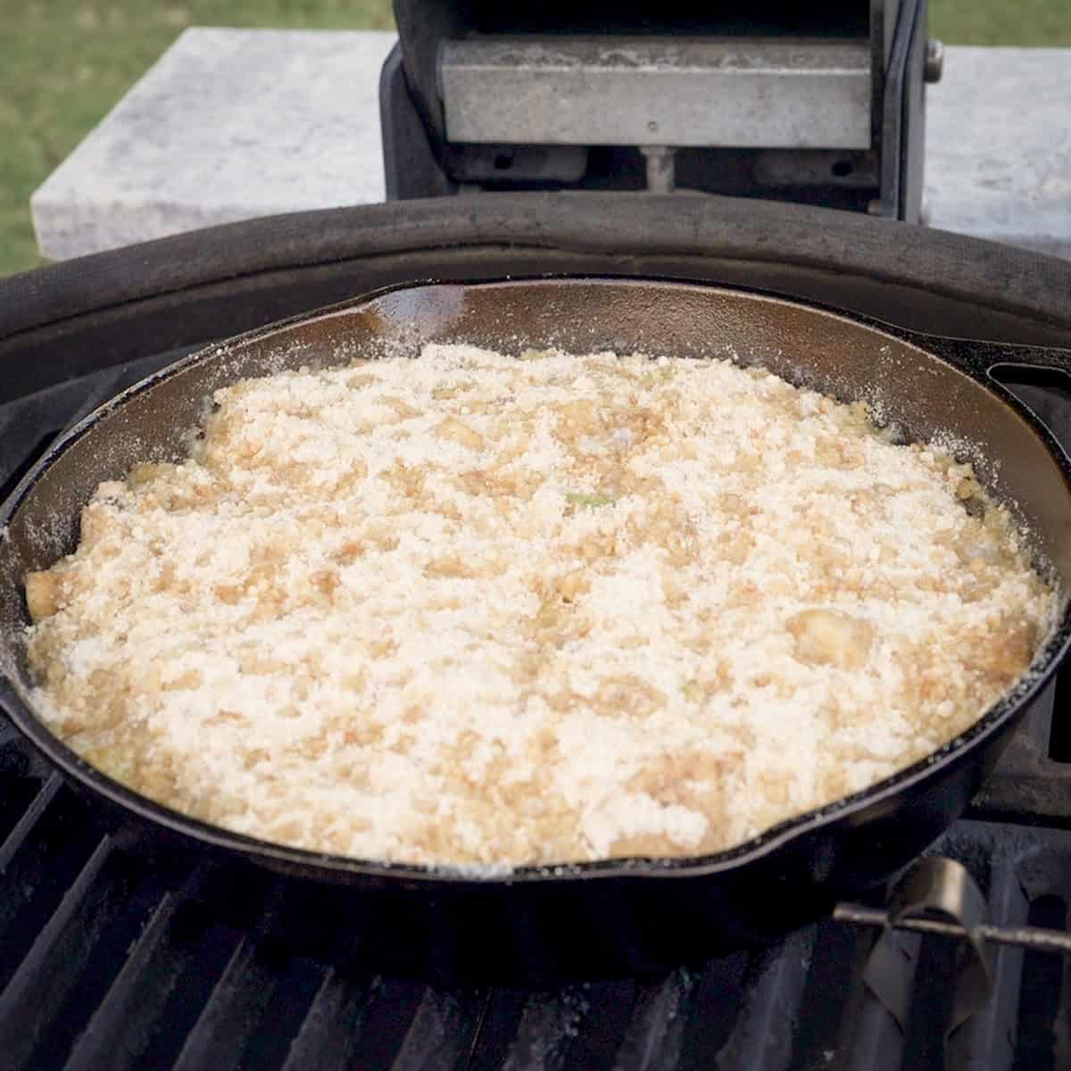 Place the assembled apple crisp in the smoker.