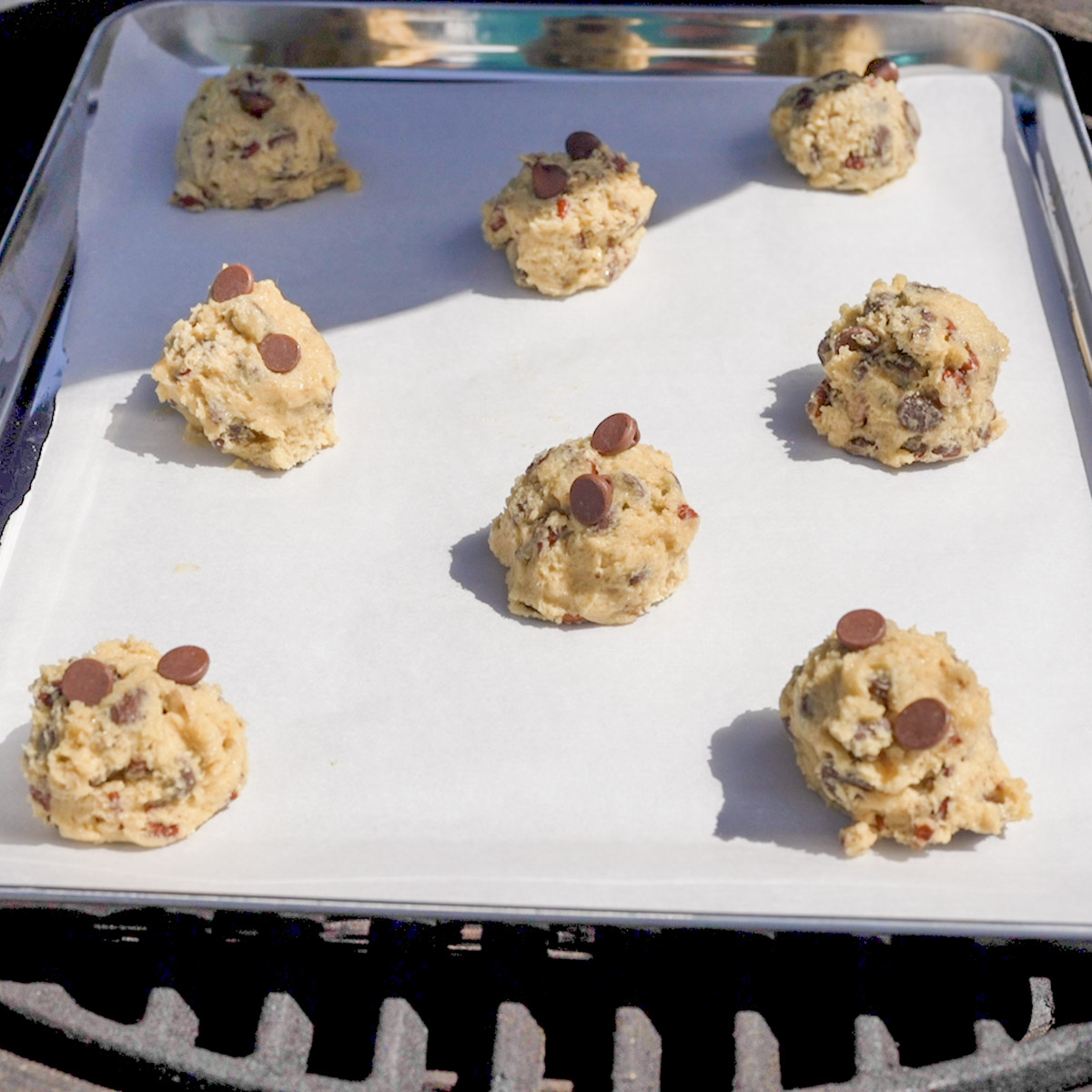 Place the baking sheet in the smoker.