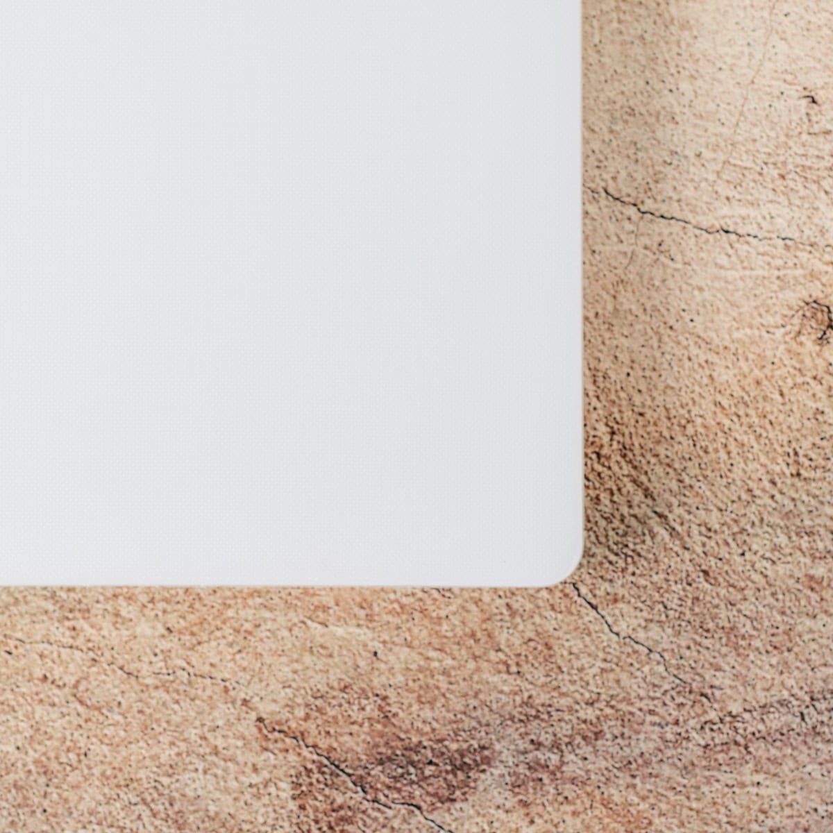 Plastic cutting board.