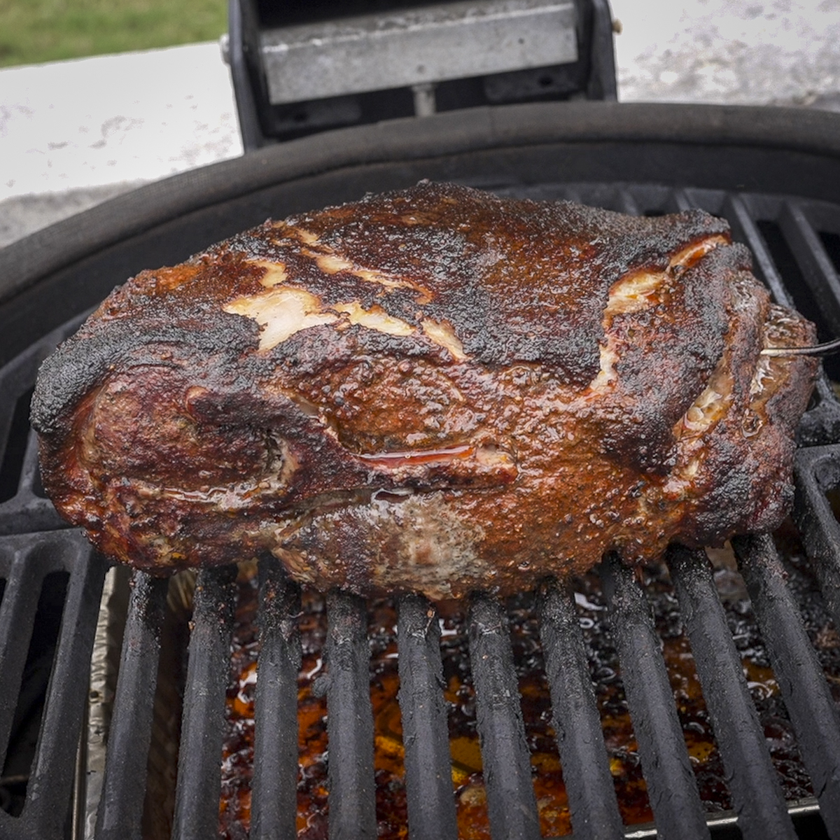 Pork shoulder over a water pan.