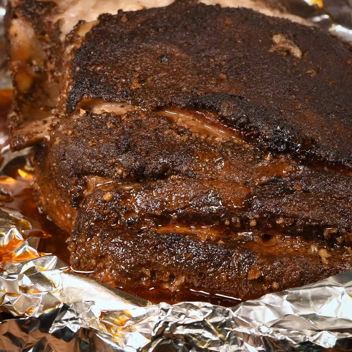 Unwrap the pork shoulder.