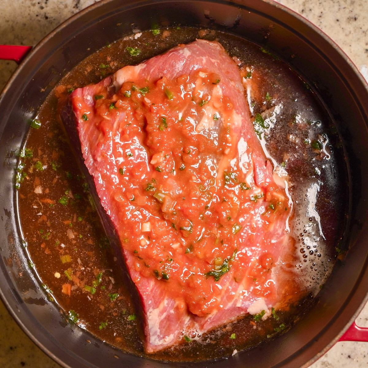 Add more sauce on top of the brisket.