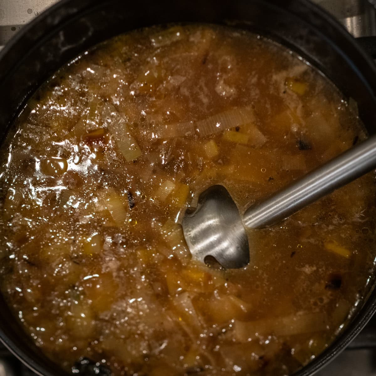 Blend soup with an immersion blender.