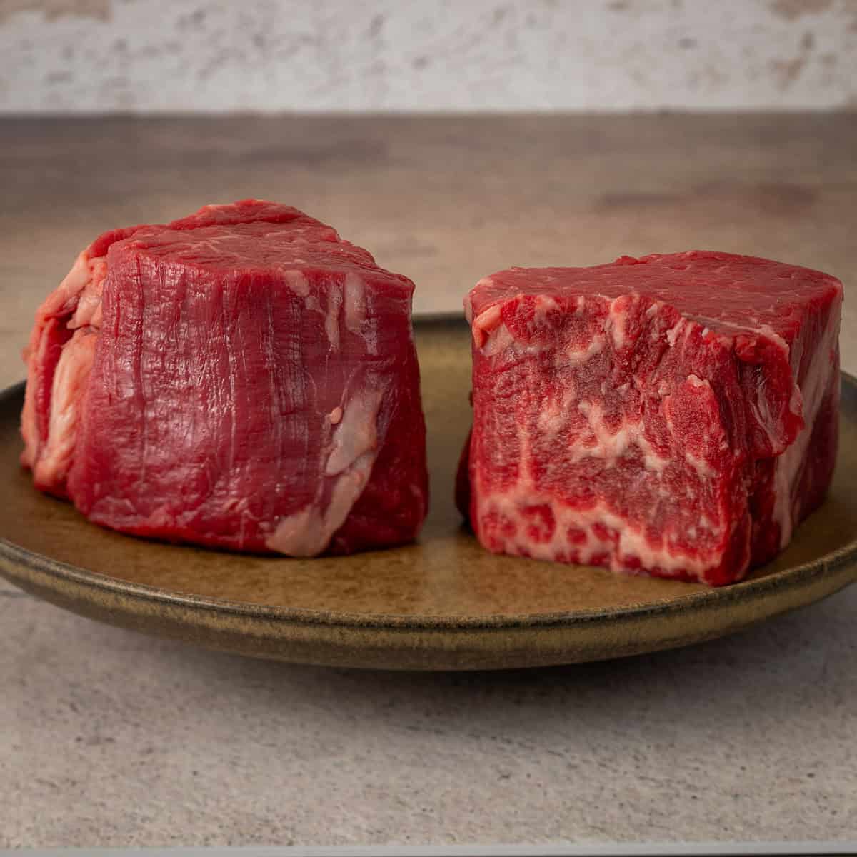 Raw Filet Mignon steaks.
