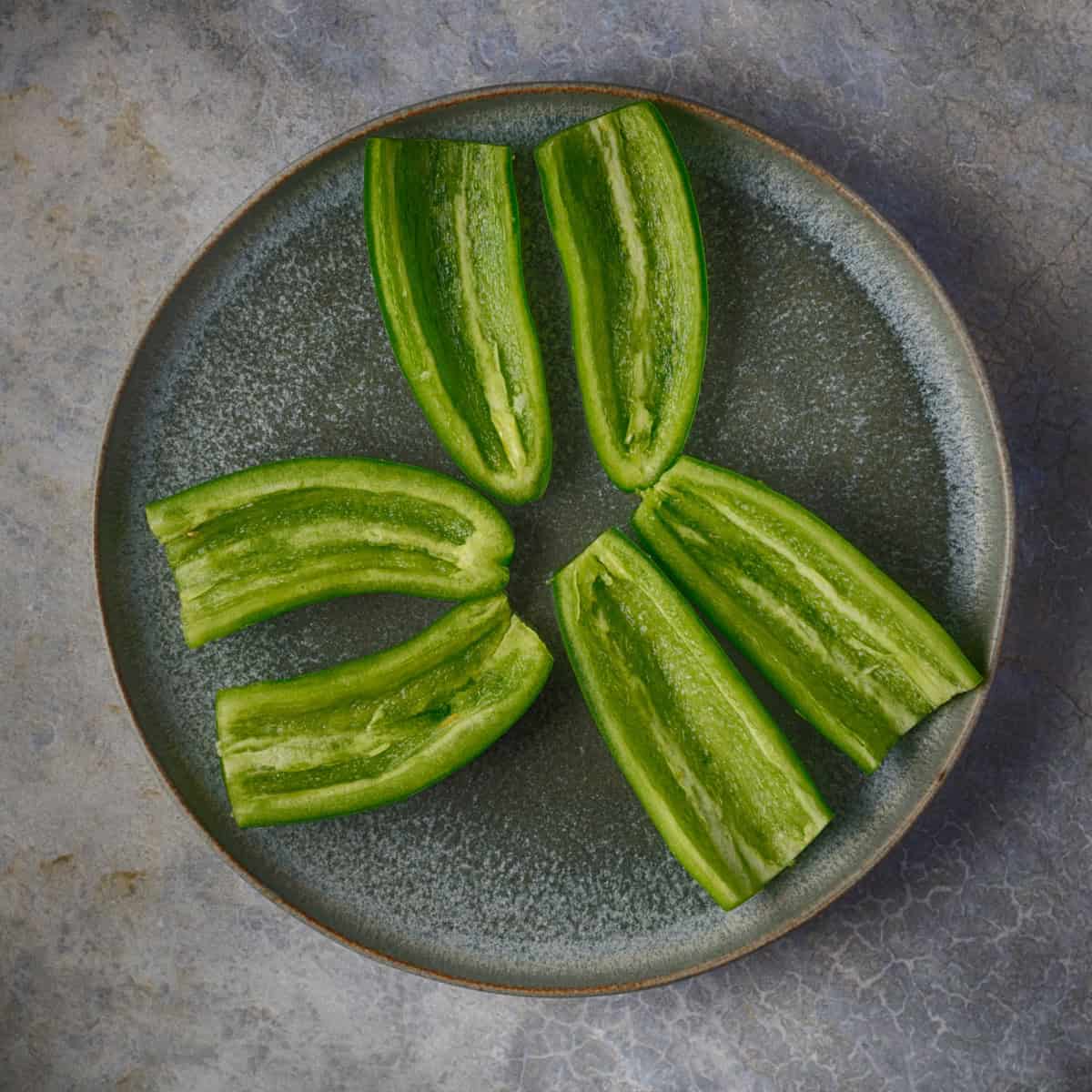 Scoop out the seeds and membrane.