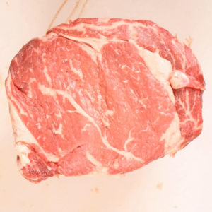 The roast is round after tying it up.
