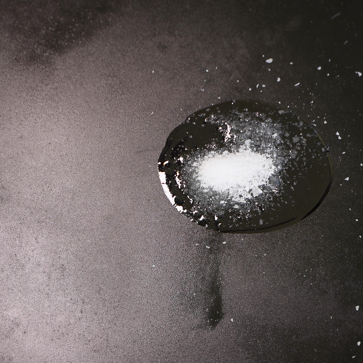 Kosher salt and olive can remove tough stuck-on food.