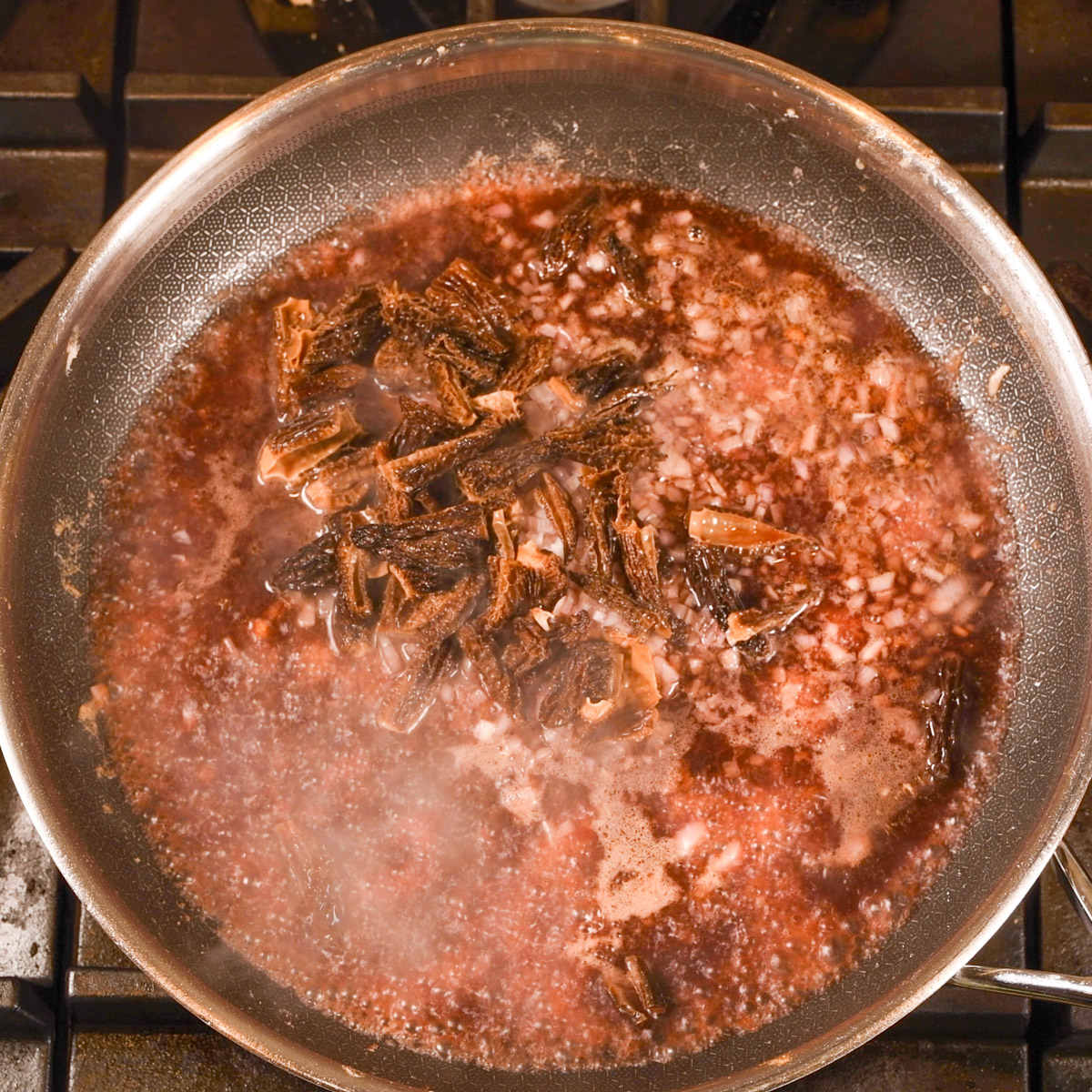 Sauté the mushrooms in port wine.