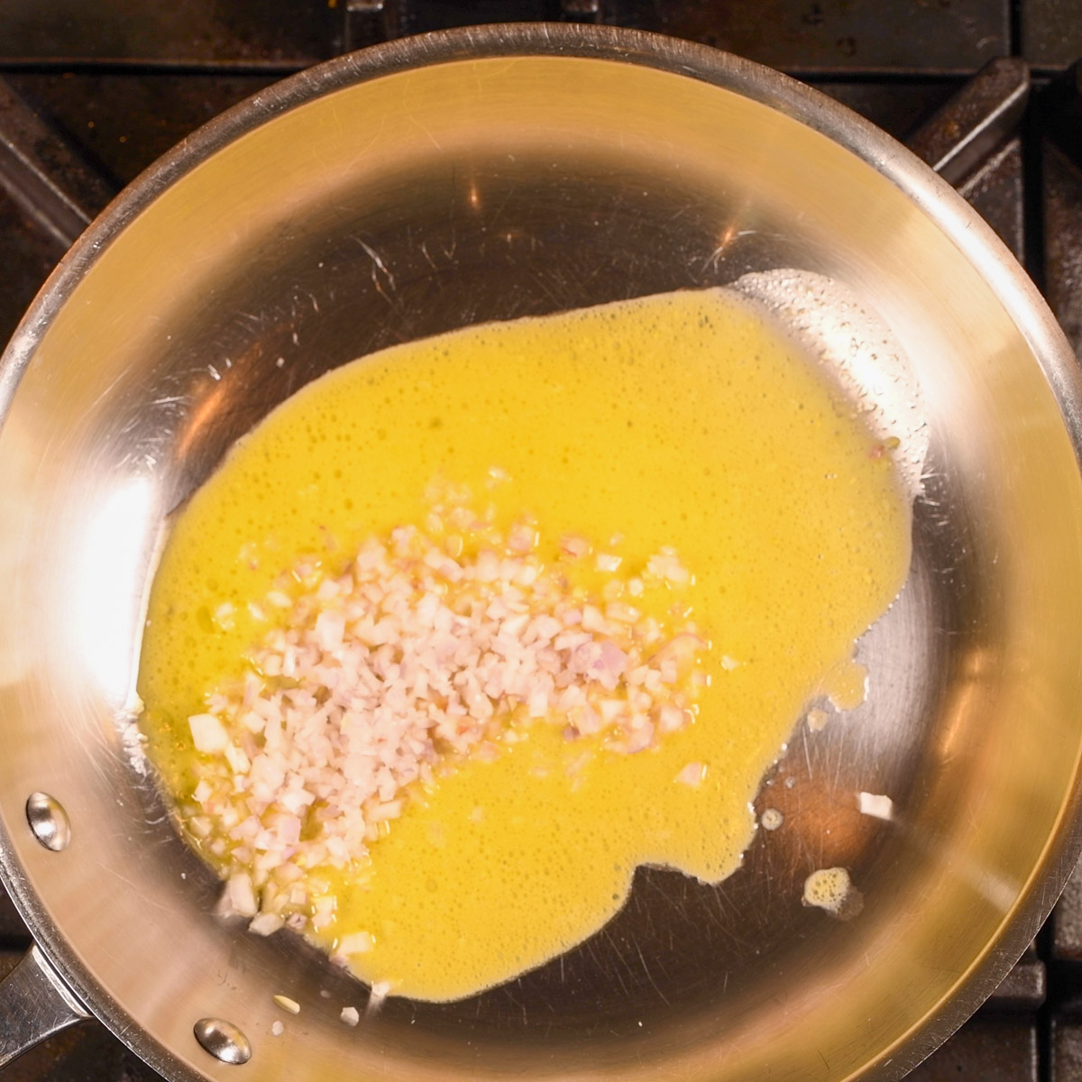 Sauté shallots in butter.