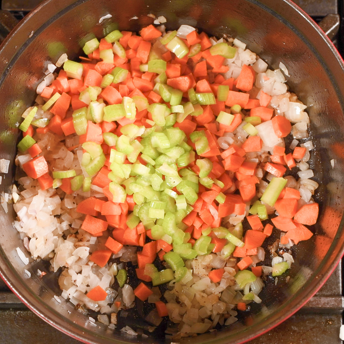Sauté the vegetables until soft.