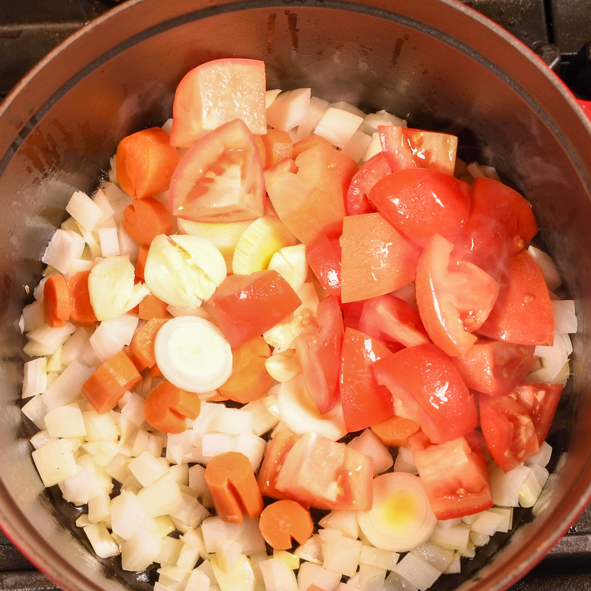 Saute vegetables for short ribs.