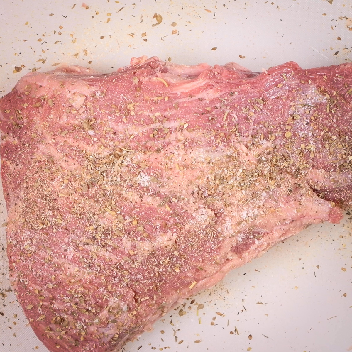 Season the tri-tip on both sides.