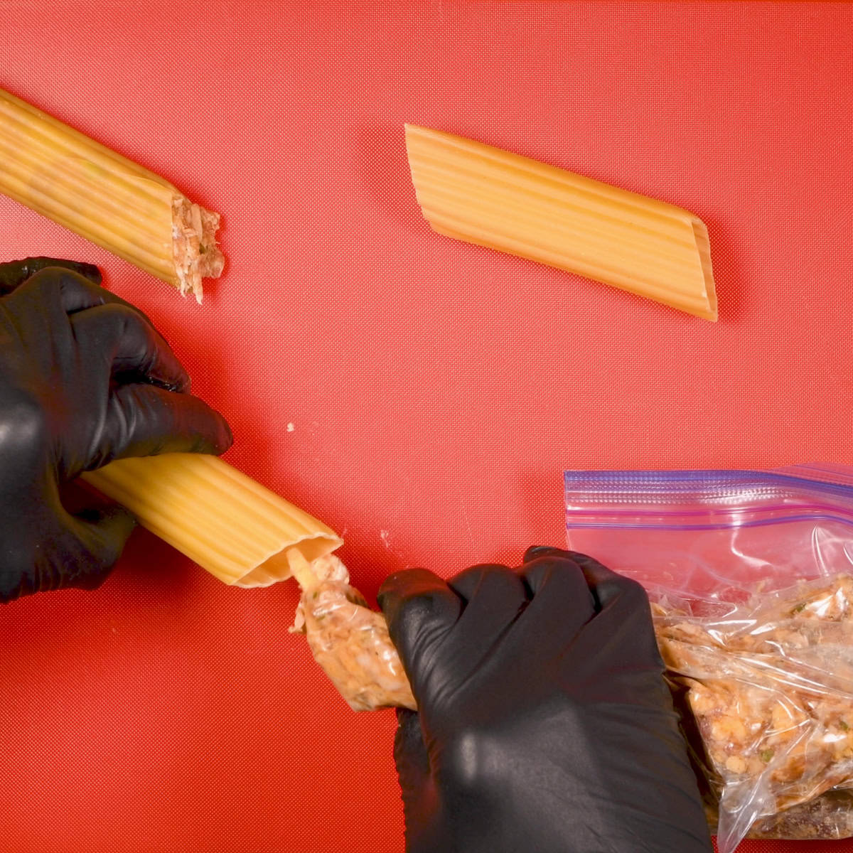 Stuff the dried manicotti shells.