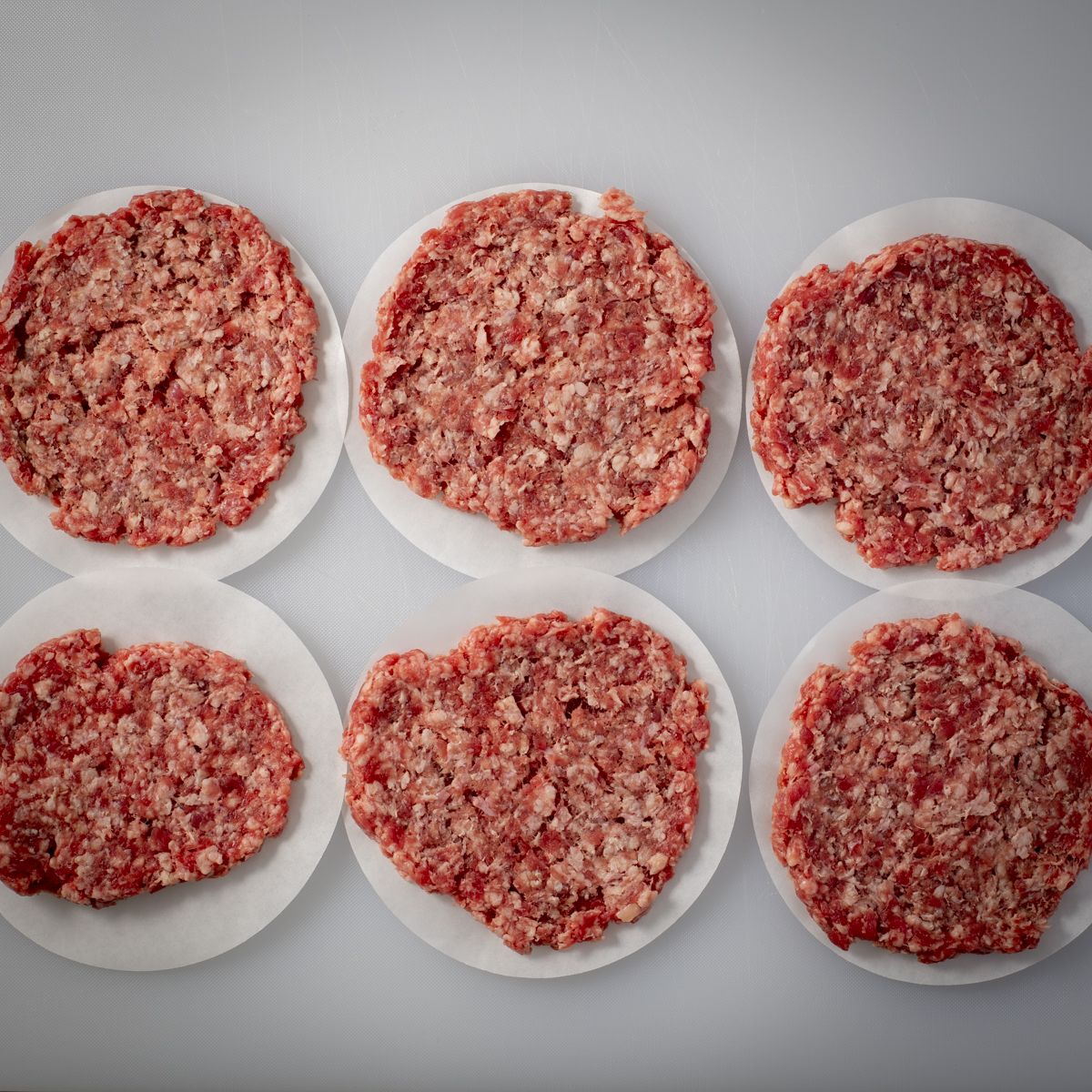 Smash burgers were made using identical 4-ounce balls of ground beef.