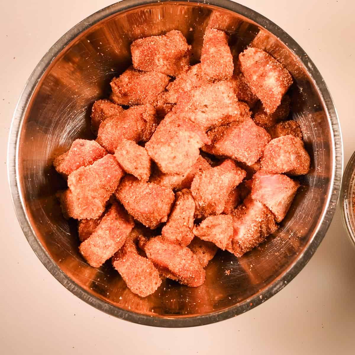 Sprinkle pork belly pieces with the dry rub.