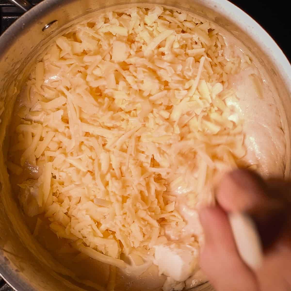 Stir in the cheeses.