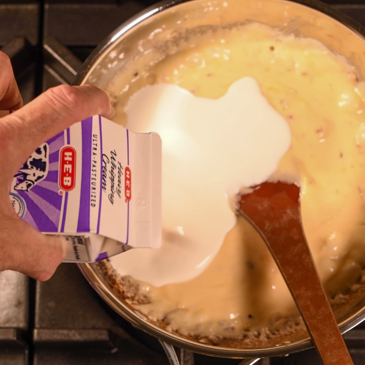 Thin the queso with more cream.