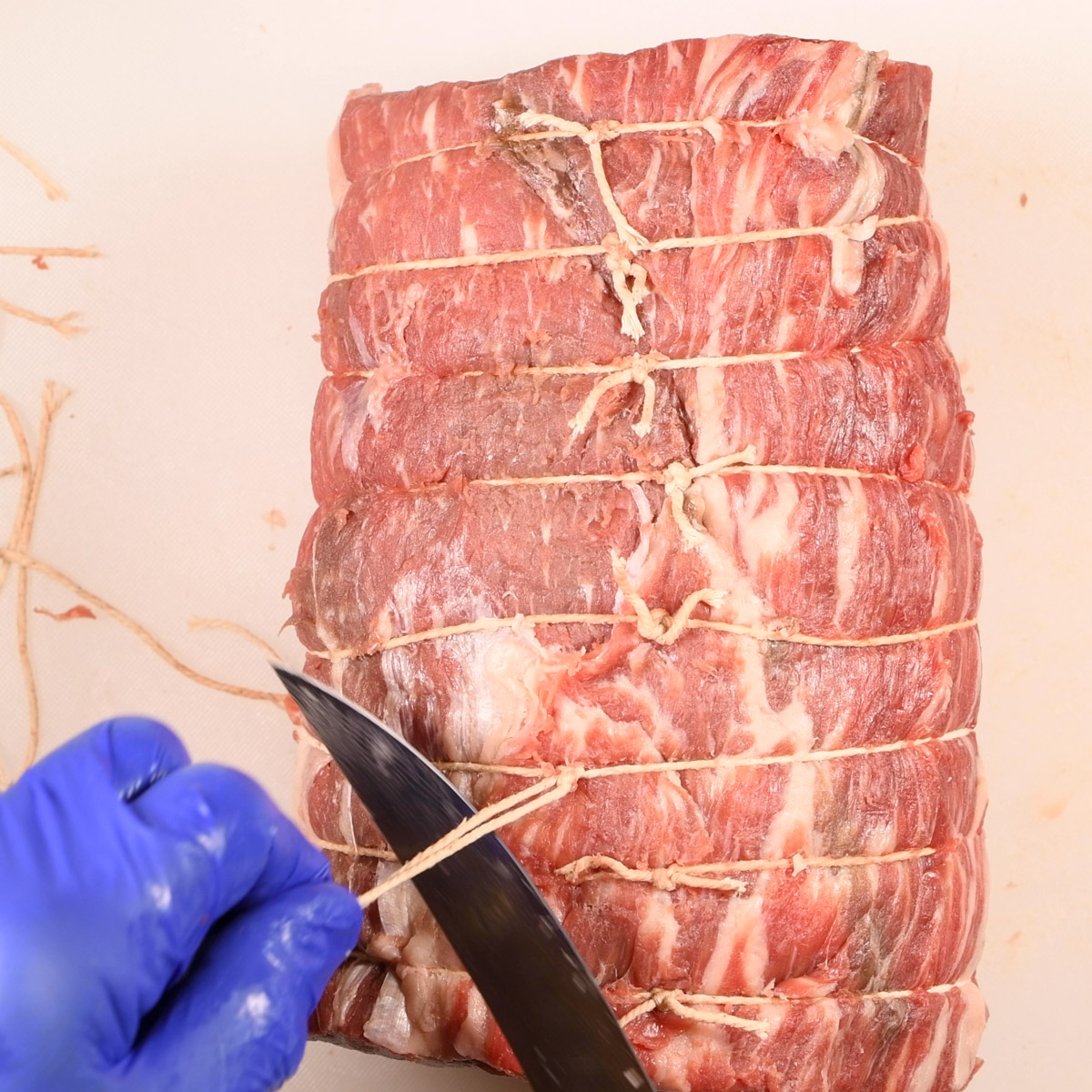 Tie the roast with kitchen twine every inch.